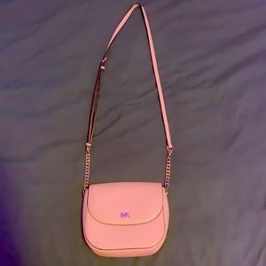 i am selling a pink nudish MK purse